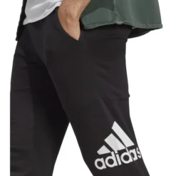 ADIDAS Men's Essentials Tapered Badge Of Sports Pants 9 ADIDAS Men's Essentials Tapered Badge Of Sports Pants -Carhar Clothing Shop 2084554 001 alt3